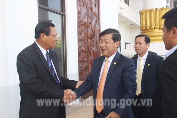 Ông Trần Thanh Liêm  Chủ tịch UBND tỉnh thăm và chúc Tết Bunpimay tại tỉnh Champasak Lào.jpg